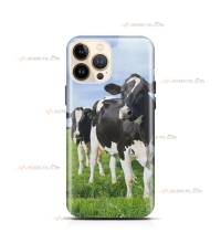 coque de téléphone avec des vaches noires et blanches